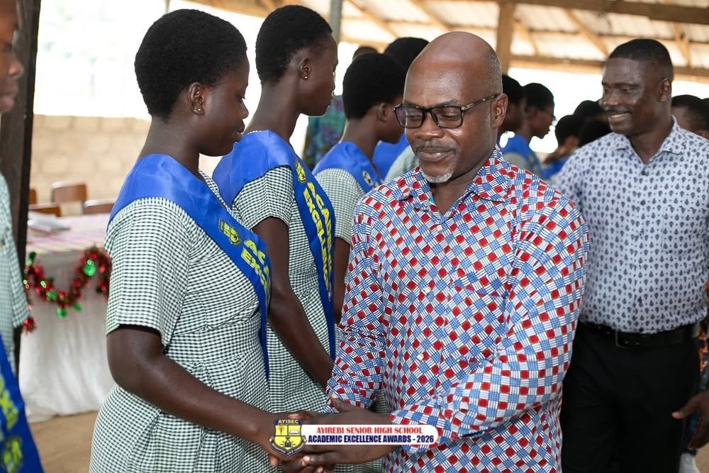 Emmanuel Frimpong Adjorlolo, Headmaster of Ayirebi Senior High School, recognising students at the Academic Excellence Awards